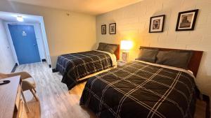 サスカトゥーンにあるConfederation Innのギャラリーの写真 +2枚の写真