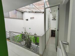 a view from the hallway of a house with a window at Hotel Génova Real in Génova