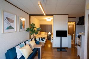 TV a/nebo společenská místnost v ubytování Furano Ski frante