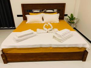 Ένα ή περισσότερα κρεβάτια σε δωμάτιο στο dasis villa