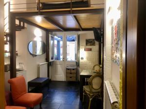 a room with a hallway with a room with a mirror at Affittacamere Monterosso 5 Terre in Monterosso al Mare +49 photos