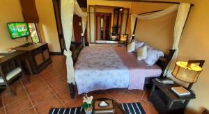 TV a/nebo společenská místnost v ubytování Valley Garden Resort