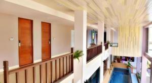 TV a/nebo společenská místnost v ubytování Na Tubthieng Boutique Resort Trang