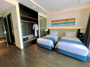 En eller flere senge i et værelse på Shaphire