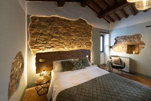 Ένα ή περισσότερα κρεβάτια σε δωμάτιο στο Agriturismo Podere Pietraluna +79 φωτογραφίες