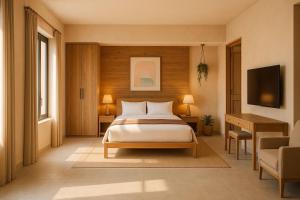 Un pat sau paturi într-o cameră la Super Quen Suite