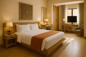 Un televizor și/sau centru de divertisment la Super Quen Suite