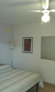Postel nebo postele na pokoji v ubytování Alba Salentina