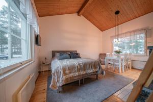 Ένα ή περισσότερα κρεβάτια σε δωμάτιο στο Lomavuokra Levi Central Kätkä Kaksi