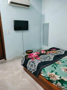 Et tv og/eller underholdning på NEW Sawan HOTEL + 3 billeder