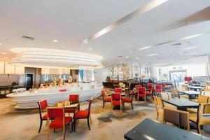 Restoran või mõni muu söögikoht majutusasutuses Grand Soluxe Zhongyou Hotel Shenzhen