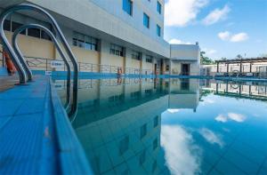 Bazén v ubytování Excemon Beach Hotel Beihai nebo v jeho okolí