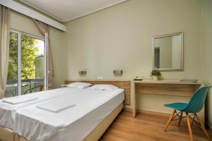 Postel nebo postele na pokoji v ubytování Park Hotel