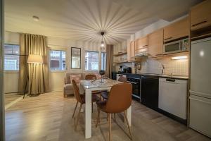 Η κουζίνα ή μικρή κουζίνα στο Lomavuokra Studio apartment A3, Levi Central, ski-in ski-out