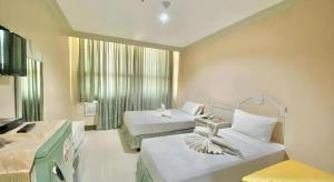 Μια τηλεόραση ή/και κέντρο ψυχαγωγίας στο Cebu Northwinds Hotel