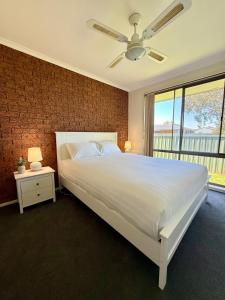 Ένα ή περισσότερα κρεβάτια σε δωμάτιο στο Quiet & Convenient