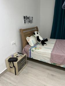 Postel nebo postele na pokoji v ubytování vegasy + 1 fotografie