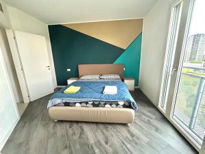 Ένα ή περισσότερα κρεβάτια σε δωμάτιο στο Merlata residence Terrace