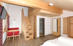 Ένα ή περισσότερα κρεβάτια σε δωμάτιο στο Berghotel Bischofalp