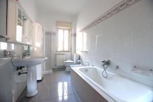 a bathroom with a sink and a tub and a toilet at B&B San Francesco in Nicosia +36 photos