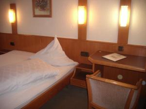 Postel nebo postele na pokoji v ubytování Landhotel Pingel