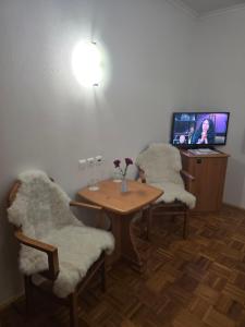 Un televizor și/sau centru de divertisment la Cozy Nook, Zreče