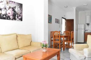 Гостиная зона в Piso Saturno Bajo C Conil