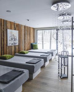 Ένα ή περισσότερα κρεβάτια σε δωμάτιο στο Gartenhotel Moser