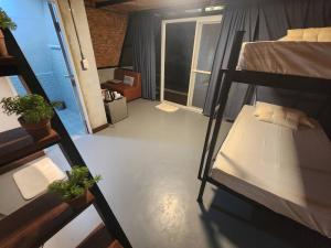 Ένα ή περισσότερα κρεβάτια σε δωμάτιο στο A Frame - ทัสวิลล่าเขาค้อ TasVilla KhaoKho