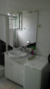 Koupelna v ubytování Apartment Gevera + 25 fotografií