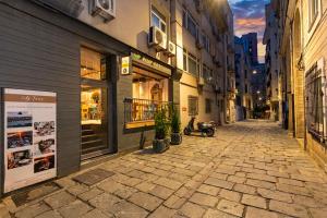 an empty street in a city with buildings at Tulip City Hotel & SPA in Istanbul
