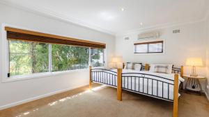 Ένα ή περισσότερα κρεβάτια σε δωμάτιο στο Point Vista Poingt Clare