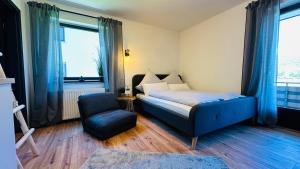 Ένα ή περισσότερα κρεβάτια σε δωμάτιο στο T&P SoodenSuite