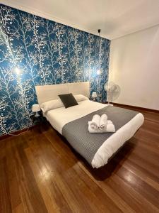 Una cama o camas en una habitación de BV Rooms