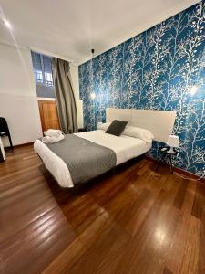 Una cama o camas en una habitación de BV Rooms