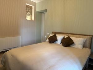 Ένα ή περισσότερα κρεβάτια σε δωμάτιο στο NessunConfine