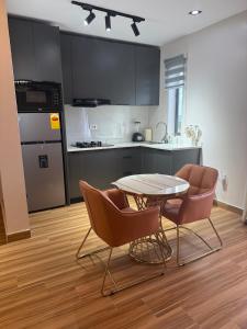 Η κουζίνα ή μικρή κουζίνα στο Peaceful Escape in a 1 bedroom Apartment