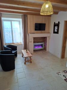 Χώρος καθιστικού στο Les Petits Jardins de Cissé Chambre de Charme