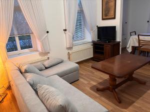 TV a/nebo společenská místnost v ubytování Ostfriesland-Haus