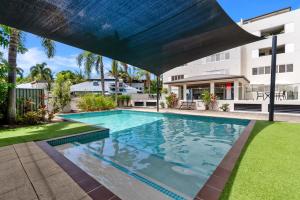 an image of a swimming pool in a house at Allure at The Edge 3brm luxury apartment with coffee machine and 2 pools! in Cairns North +29 photos