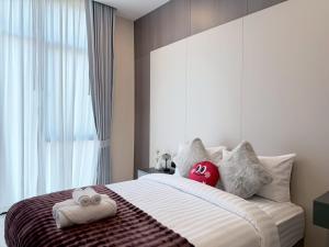 En eller flere senge i et værelse på Chilla B villa + 21 billeder