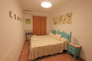 En eller flere senge i et værelse på La Bondadosa + 13 billeder