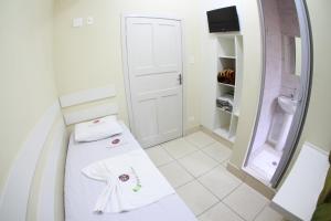 Ванная комната в Hotel Curitibano