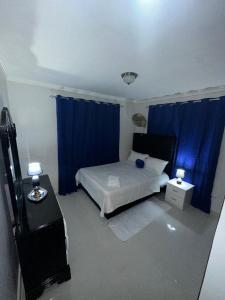 Ένα ή περισσότερα κρεβάτια σε δωμάτιο στο Estilo & Confort +36 φωτογραφίες