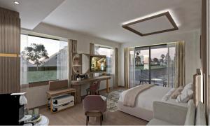 ein Schlafzimmer mit einem Bett und einem Schreibtisch mit einem Computer in der Unterkunft Sola Dahabiya Nile Cruise Every Monday from Luxor to Aswan 4 nights and Every Friday from Aswan to Luxor 3 nights in Luxor