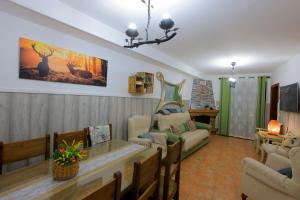 Posezení v ubytování Vivienda Rural LA SOÑADA en El Bosque