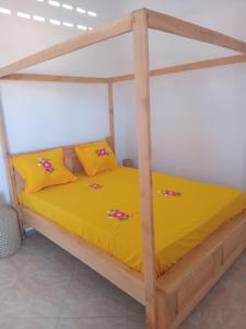 Ένα ή περισσότερα κρεβάτια σε δωμάτιο στο Residence wa maore