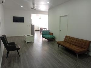 Posezení v ubytování Pacific Fitness Apartments + 4 fotografie