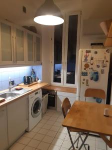 Η κουζίνα ή μικρή κουζίνα στο Wolność 2 poziomowy apartament