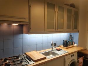 Η κουζίνα ή μικρή κουζίνα στο Wolność 2 poziomowy apartament